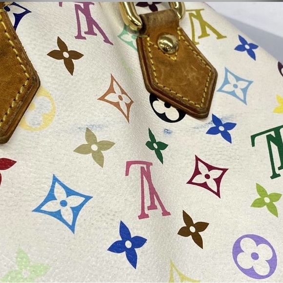 Louis Vuitton
x Takashi Murakami Monogram Multicolore Audra Authenticated white - Picture 15 of 16